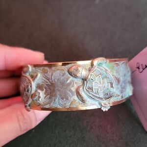 Turtle Design Bracelet with Gold Accents